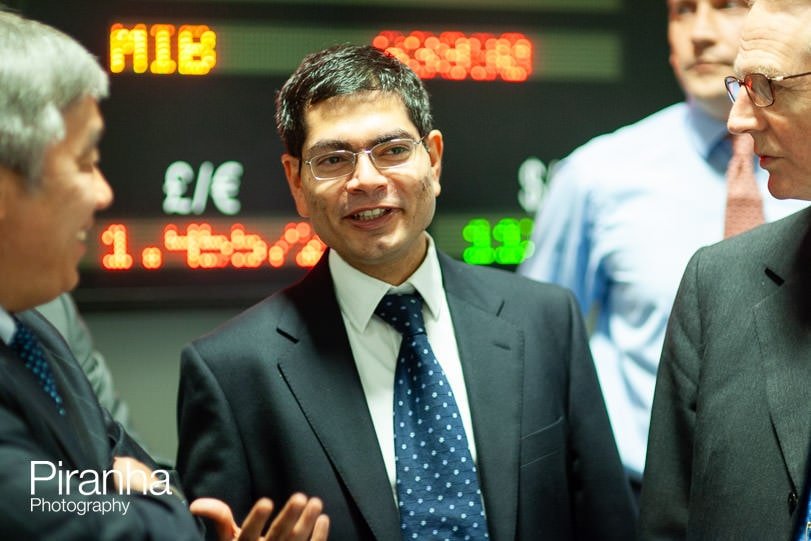 London photographer - coverage of company's flotation at bank's offices.