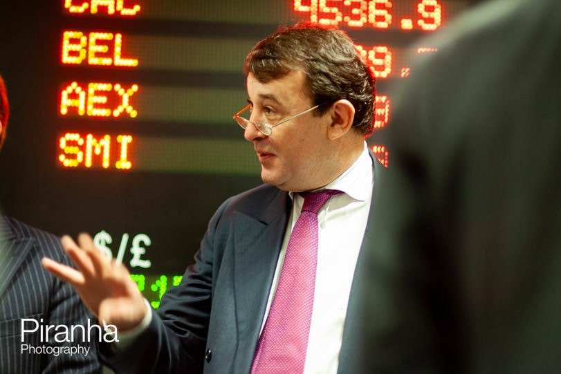 London photographer - coverage of company's flotation at bank's offices.