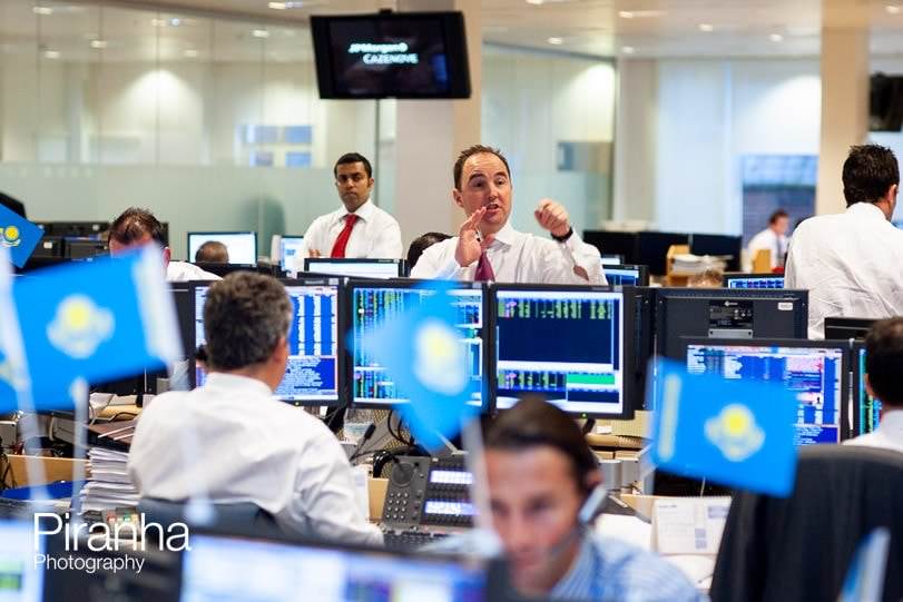 London photographer - coverage of IPO at bank's offices.