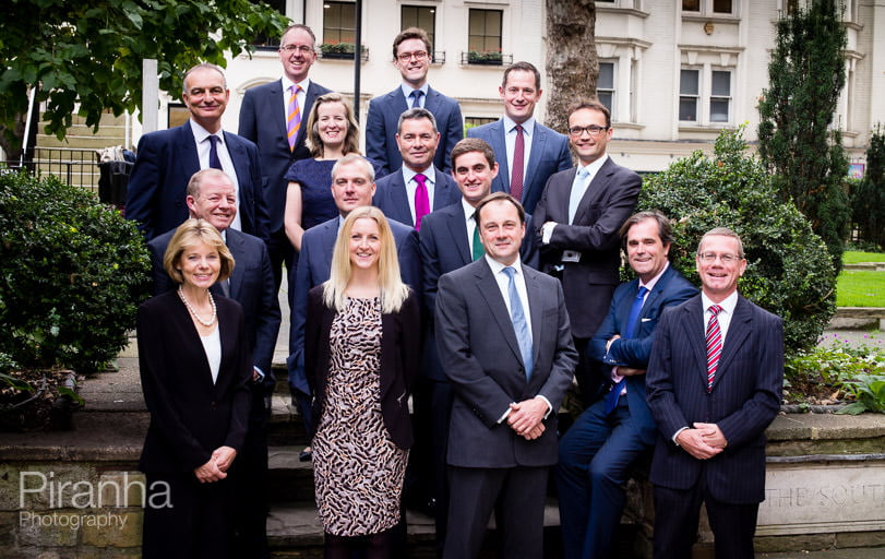 team photograph taken outdoors in Mayfair London