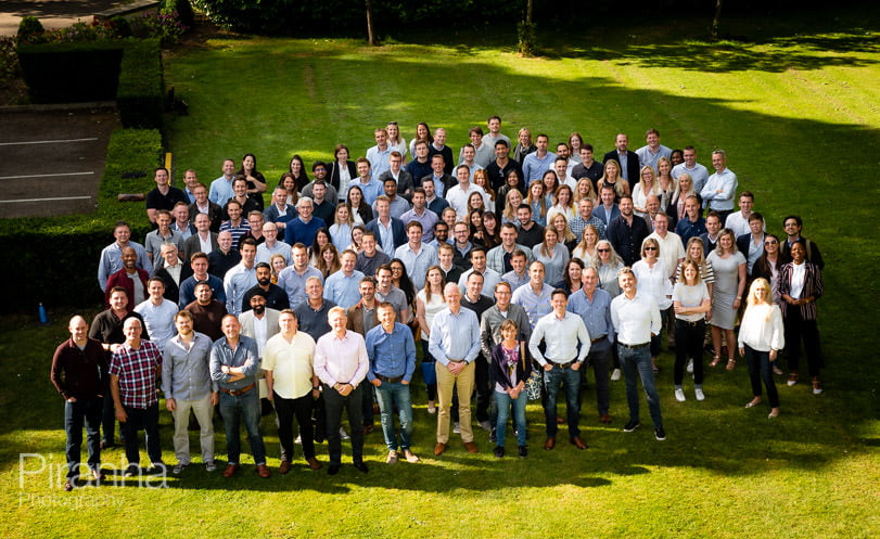 Larger group - team photographed on company away day at hotel