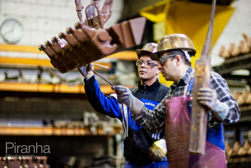 Factory worker photographed in Germany for private equity client.