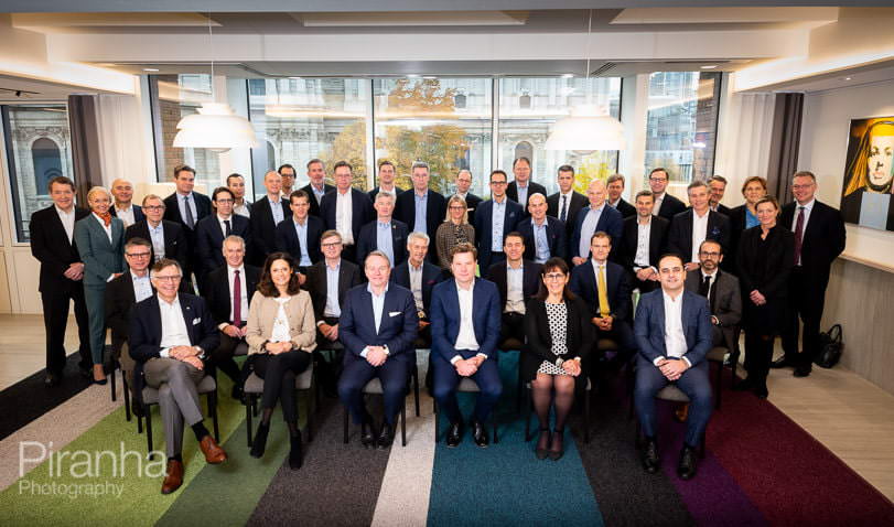 Corporate Photographer Discusses How to Best Organise and Take Group Photographs 6 Larger group photograph - organised so that everyone will be visible in large London office space