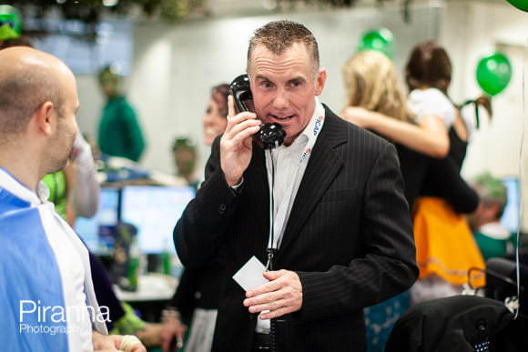 Event Photography of ICAP's Charity Day 2009 in London 5 Celebrity encouraging charitable donations by phone - Gary Rhodes