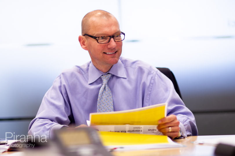 Board Photography for use in Torus's Annual Report 6 Board room photograph of individual board member in a meeting