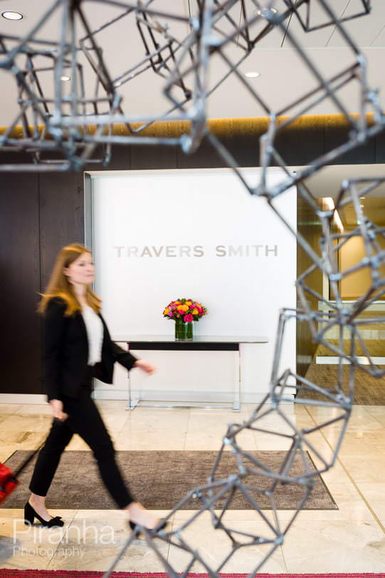 Photography at law firm for graduate recruitment brochure - logo in reception and walking people