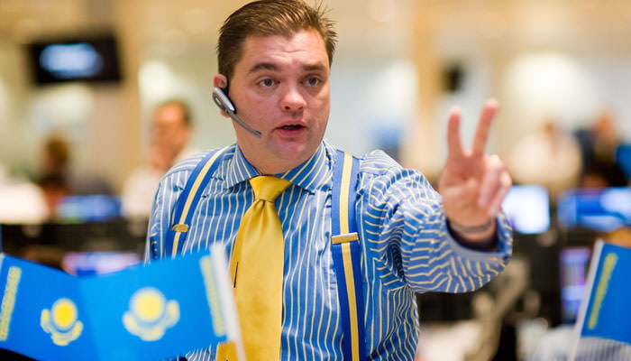 Photograph of dealer at J.P. Morgan Cazenove on day of IPO