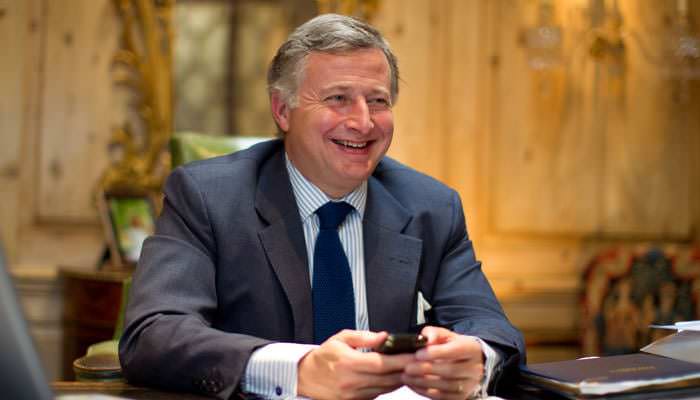 CEO of antique company photographed for PR purposes