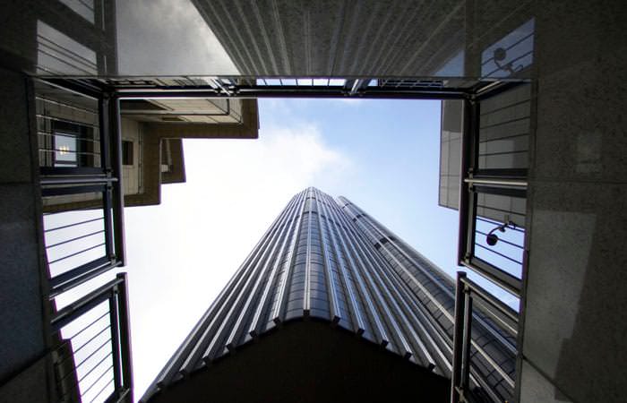Annual report photographer took exterior of building in City of London looking up Annual report photographer took exterior of building in City of London looking up