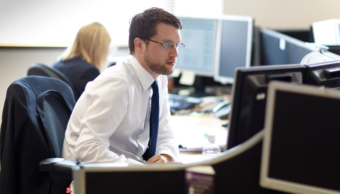 Office Photograph of Member of Staff Working
