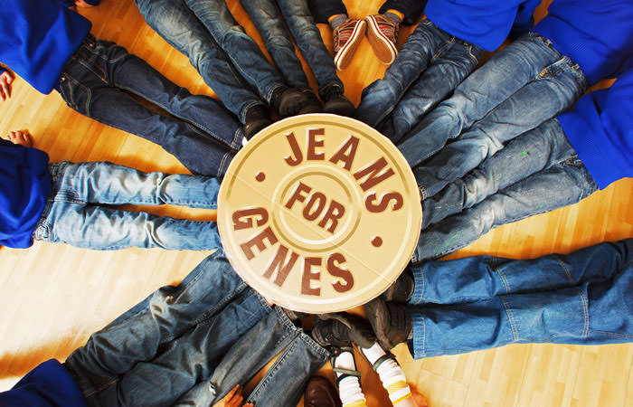 Photograph of children taking part in Jeans for Genes day, in London