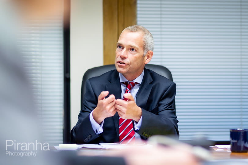 Board photography in working meeting for FTSE100 company