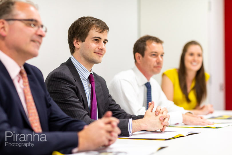 Management photography in working meeting for FTSE100 company