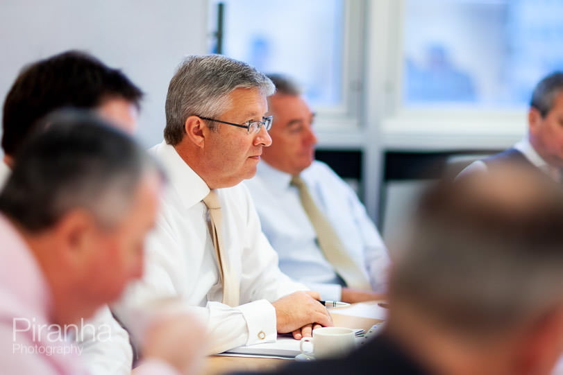 Board photography in working meeting for FTSE100 company