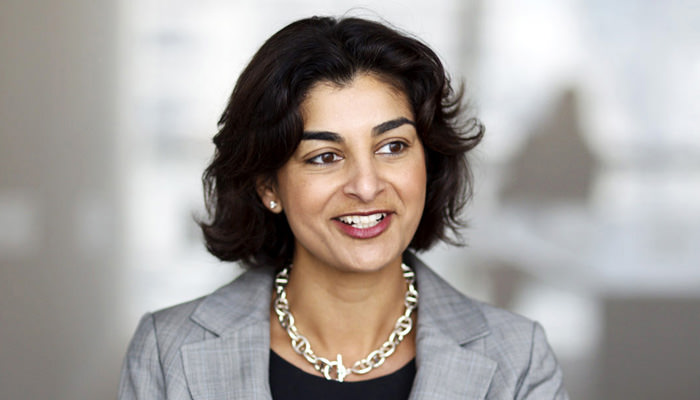 director-photograph-meeting-london Photograph of Bank Board Member for Annual Report