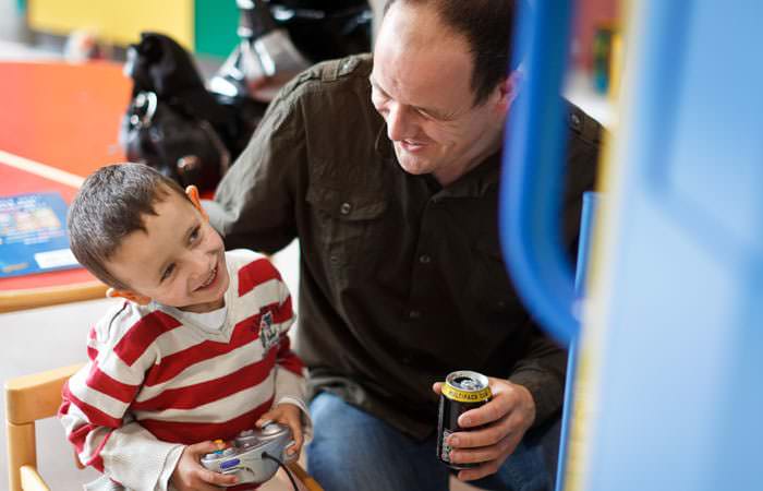 Photograph of Boy with Dad at Great Ormond Street Hospital, London