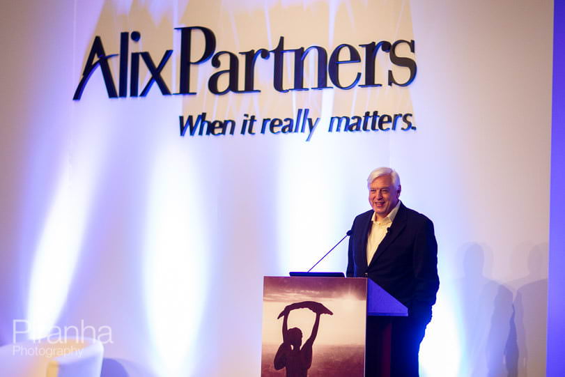 John Simpson speaking at corporate conference in Budapest