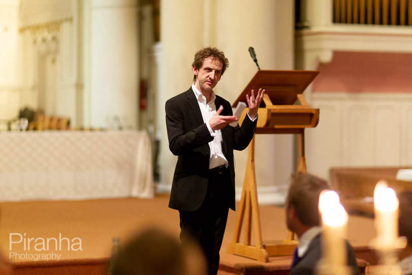 speaker photographed at London charity event