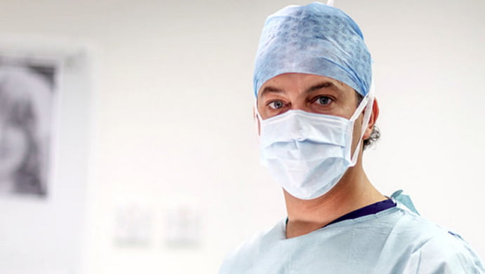 Photograph of London surgeon at work