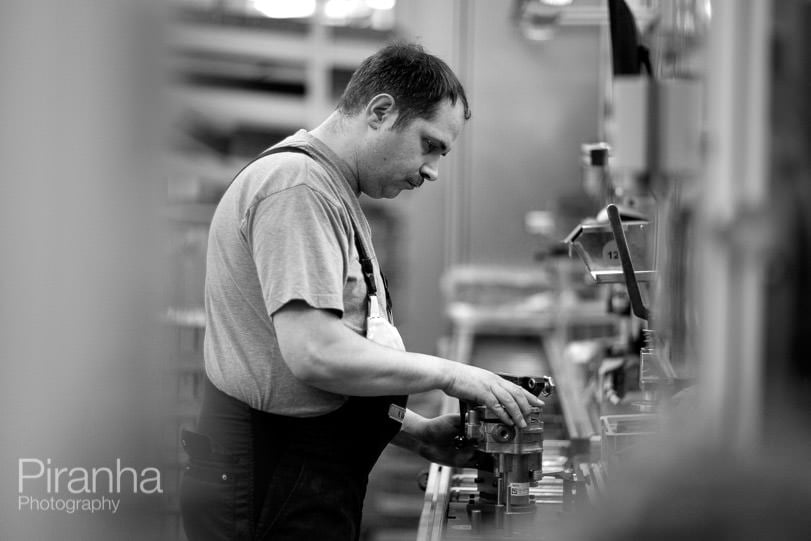 Working shot of factory worker pictured in blacka nd white