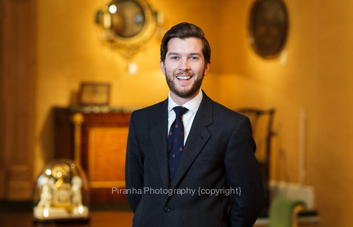 Corporate Photographer London - photograph of member of staff working in Mayfair Antiques shop