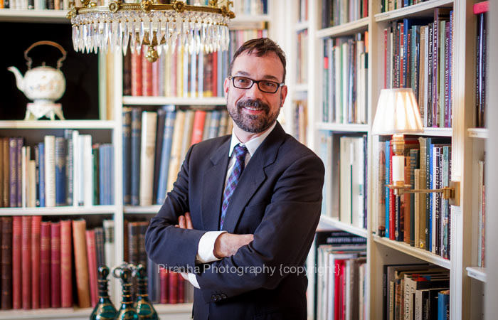 Corporate Photographer London - staff photographed in antiques shop in London