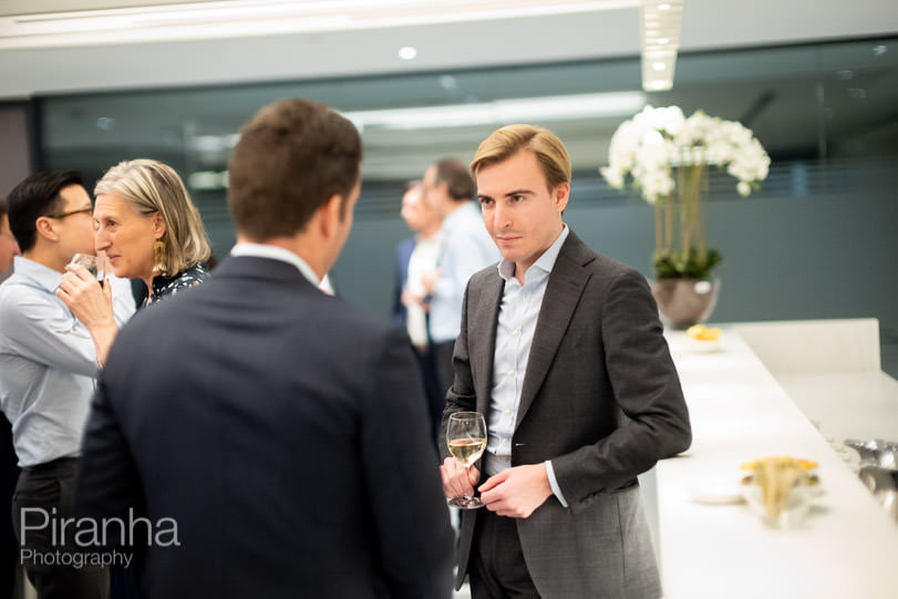Private equity company evening event photography in London - guests at drinks party