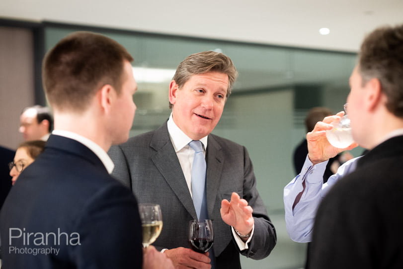Private equity company evening event photography in London - guests at drinks party