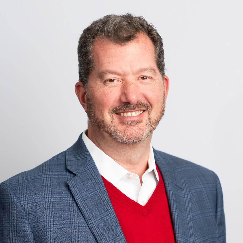 Oxford Company Photography at Oxford Science Park 2 Oxford company headshot of staff member against plain background taken at Oxford Science Park