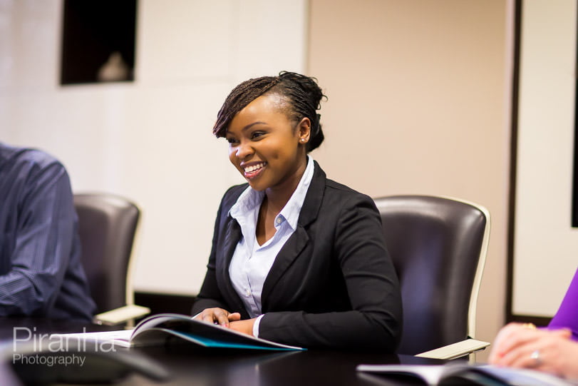 graduate new joiner of London bank photographed in meeting