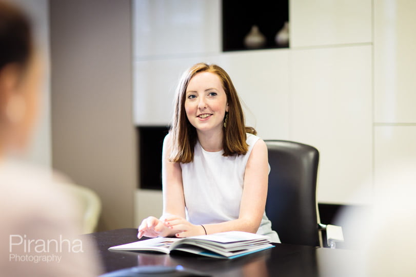  London bank staff member photographed in meeting