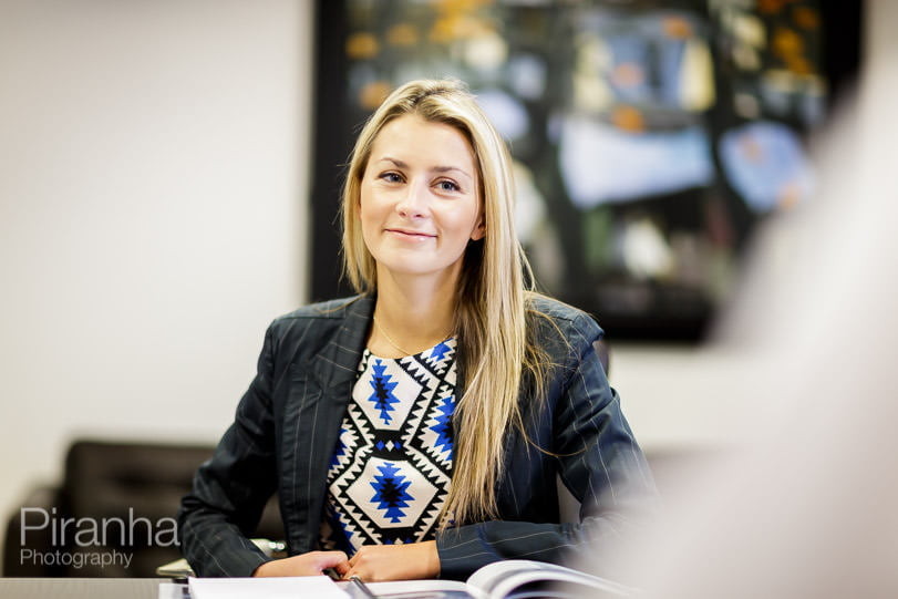 new staff member of London bank photographed in meeting