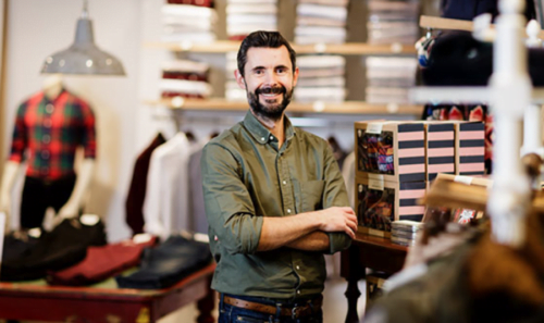 Director photographed in London clothing store