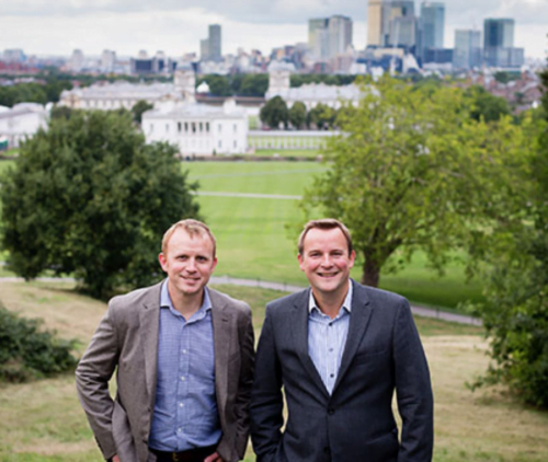 Press photograph of directors in Greenwich after contract win