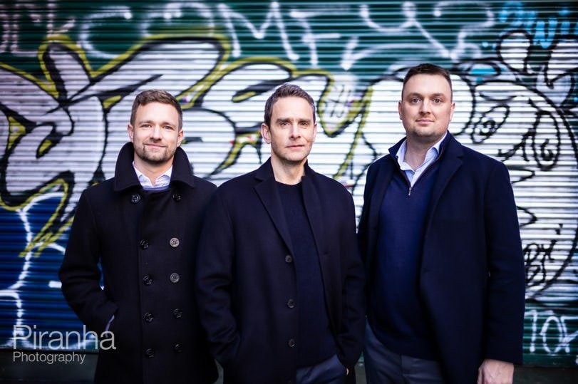 Group photograph of Directors taken outdoors in Soho