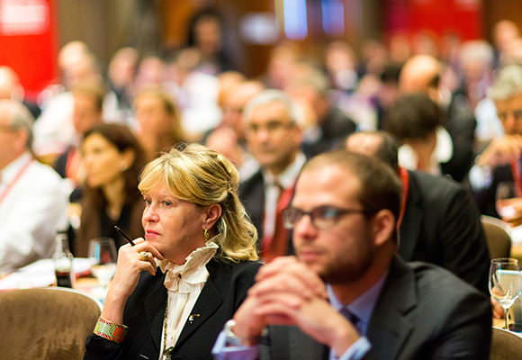 Investors listening to speaker at Investor conference in London