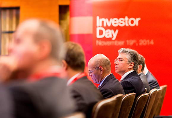 Investors listening to speaker in London at event