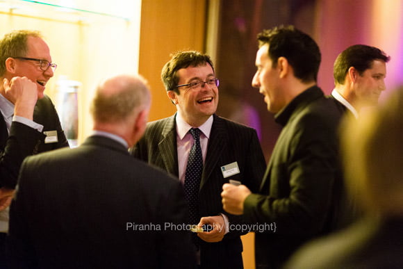 Corporate Photographer London - Haberdashers Hall party photography of guests enjoying the evening