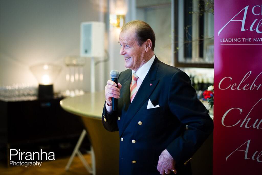Sir Roger Moore making speach at awards ceremony