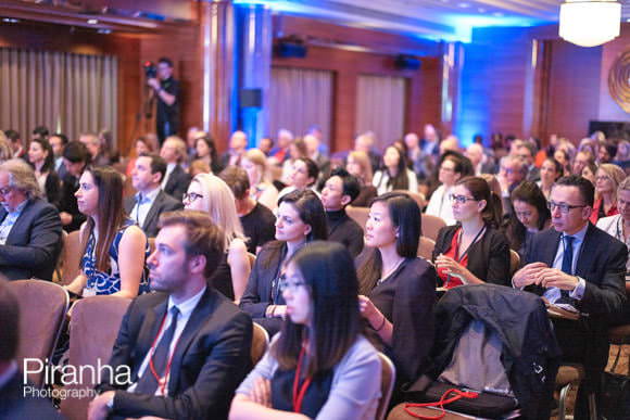 Audience at Law Conference Photographed listening to speaker
