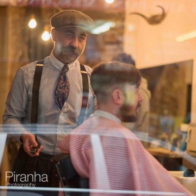 Photograph taken in Soho during street photography course of barber