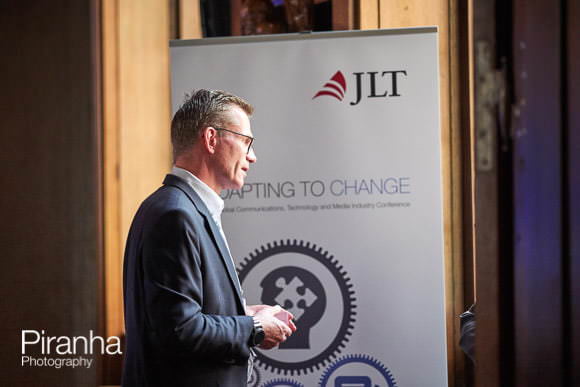 Speaker addressing audience at event