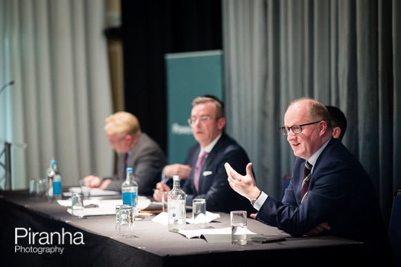 Corporate Event Photographed at Glazier's Hall in London 8 Speakers talking to audience during London event
