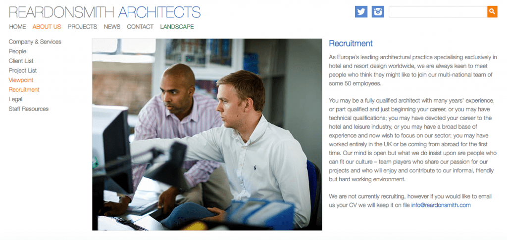 Architects Website Photograph of two people discussing a project