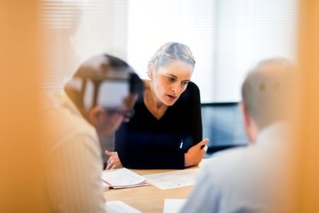 Portrait of employee shot through glass for contemporary look