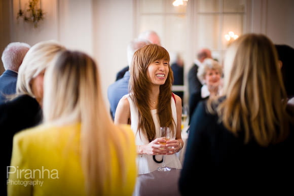 guests at drinks reception in London photographed by Piranha