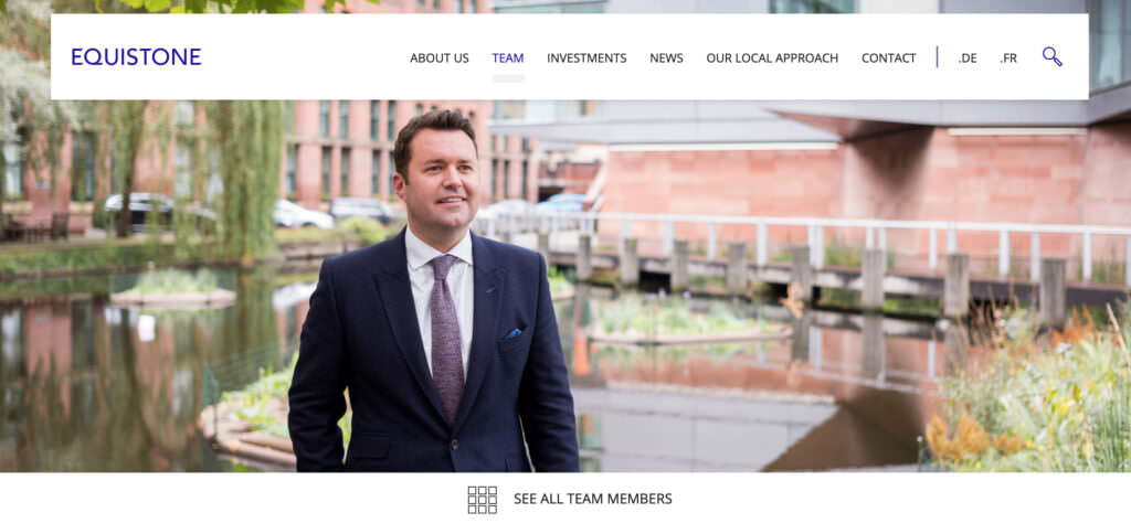 Team member portrait photograph taken outside