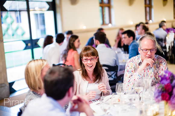 Guest during dinner at summer party in Buckinghamshire for corporate event