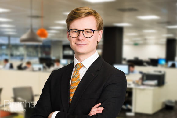 Employee photographed in London offices for construction company client