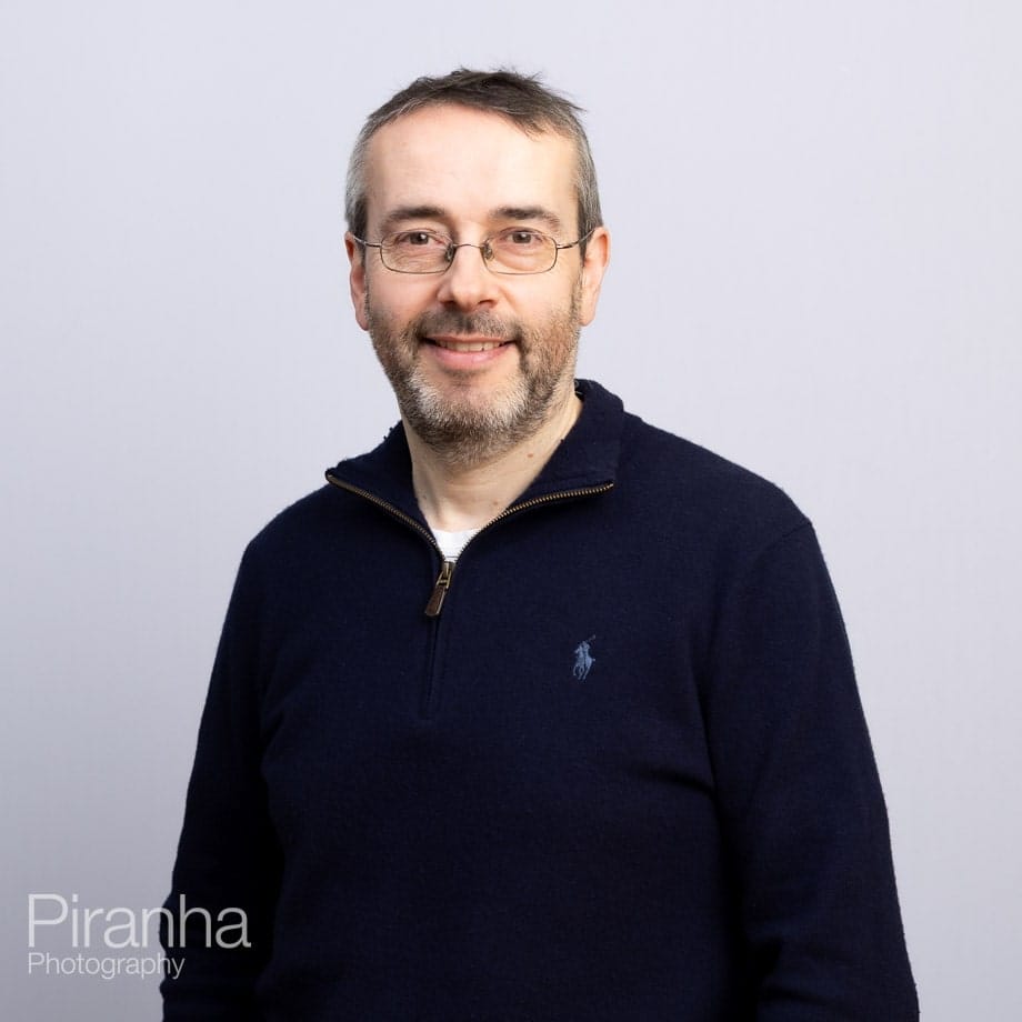 Plain Background Headshot Photography by Team Photographer Matt 7 Headshots against white backdrop.